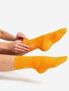 Bild von Socken Padu in OM-orange von The Spirit of Om